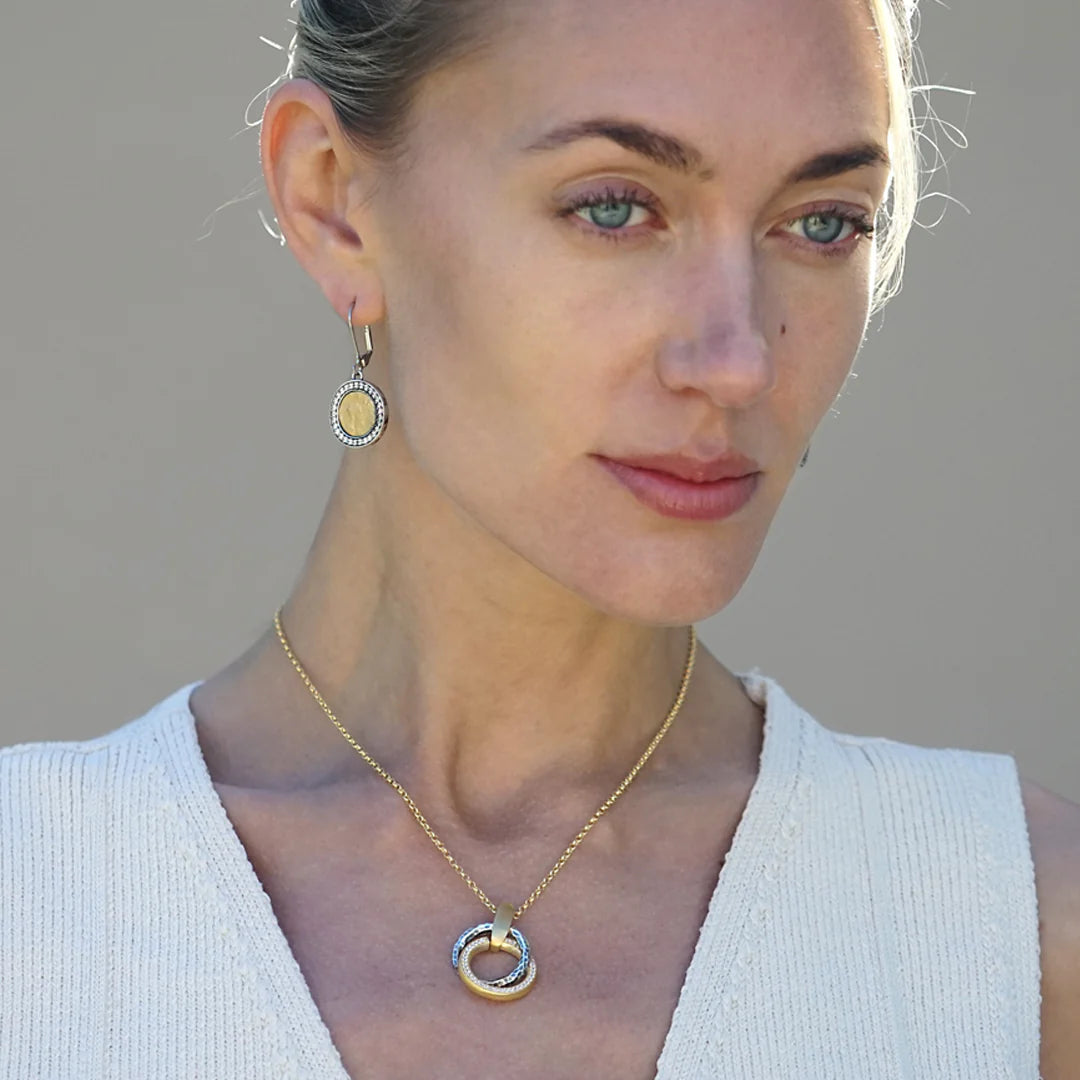 MIXED METAL TRINITY NECKLACE